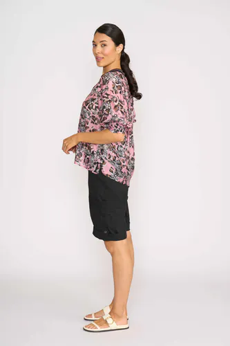 Model wearing Floral Leopard Rib Trim Blouse By Memo Available at Beetees Nelson